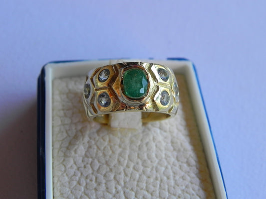 anello oro giallo  18kt smeraldo e topazi